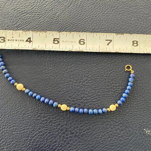 Blue and white beaded bracelet